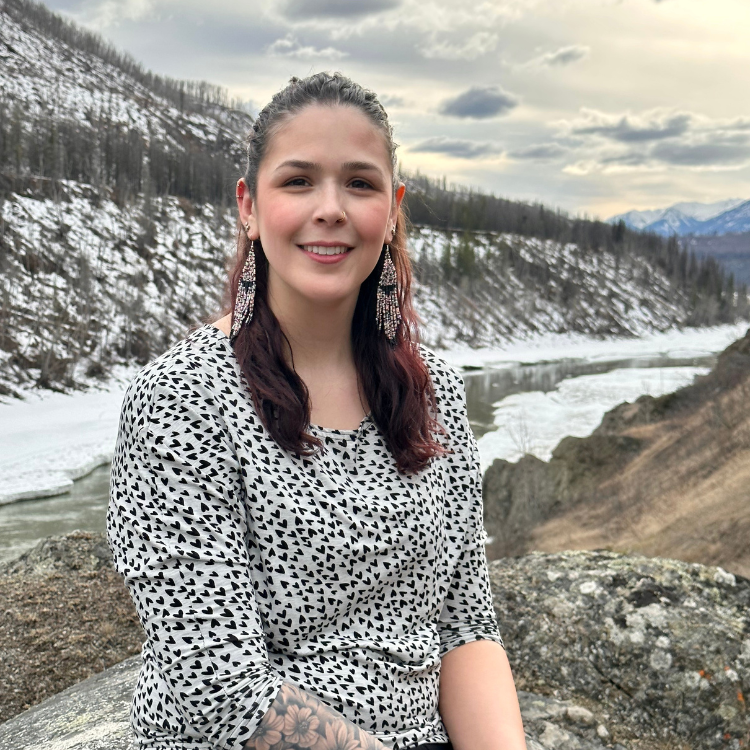 Manitoba EMDR Therapists - British Columbia EMDR Therapists - Grigore Counselling Associate Lacey Poltorasky sitting by creek.